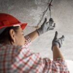 Electrical and Plumbing Services in Lucknow 3 low angle female construction worker with light bulb