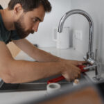 side view man working as plumber 1